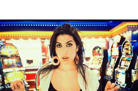 Amy Winehouse laid bare in stunning photos released for the。